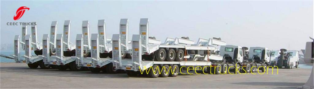 3 Axle low bed semitrailer packed for shipment 3 Axle low bed semitrailer packed for shipment
