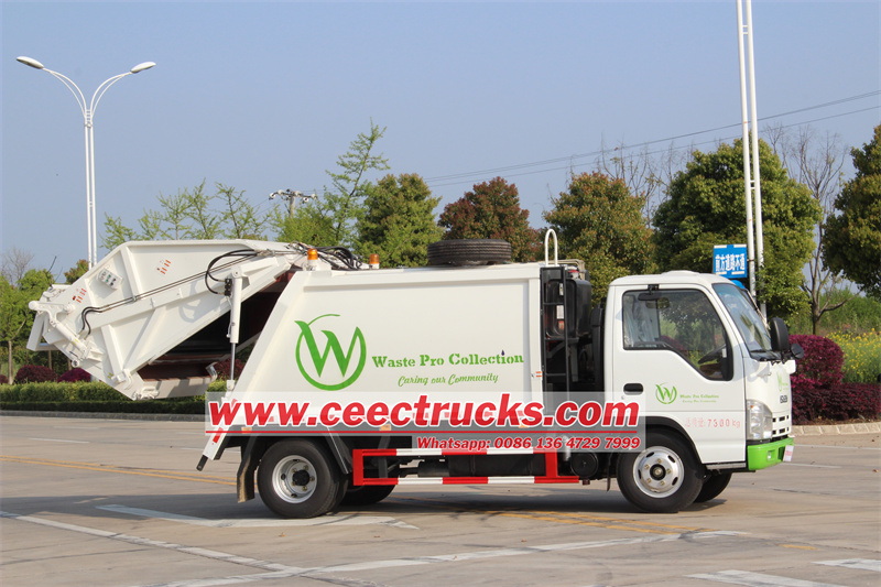 Isuzu rear loader compactor truck