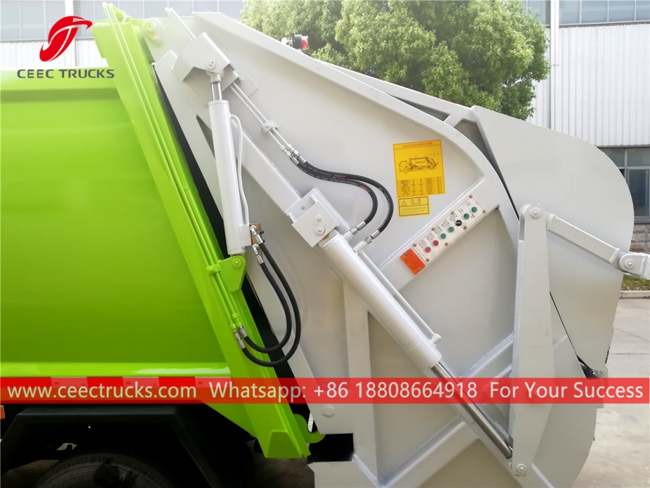 Lori mampatan sampah ISUZU 4*2