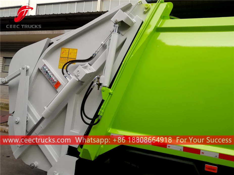 Lori mampatan sampah ISUZU 4*2