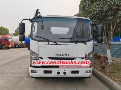 Isuzu water hauling tanker truck